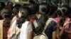 Women stand at a crowded place in the southern Indian city of Bangalore, Oct. 9, 2006. Safety is the biggest concern for women using public and private transport, according to a survey Thursday.