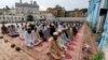 Muslims attend the Eid al-Adha prayer at a mosque in Rawalpindi