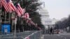 A view down Pennsylvania Avenue shows the security around the Capitol Hill in Washington, Friday, Jan. 15, 2021, ahead of the inauguration of President-elect Joe Biden and Vice President-elect Kamala Harris. (AP Photo/Susan Walsh)